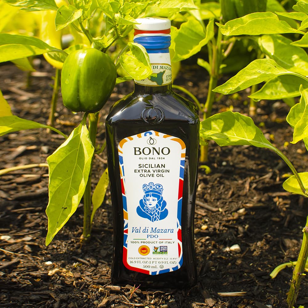 Bono olive oil drizzle over salad highlighting fruity notes and balanced finish.