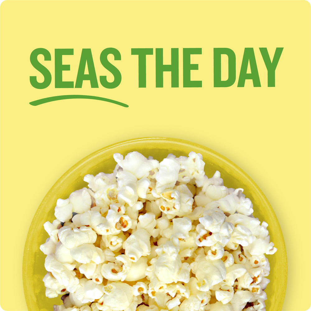 Angie's BoomChickapop popcorn at a casual movie night with friends.