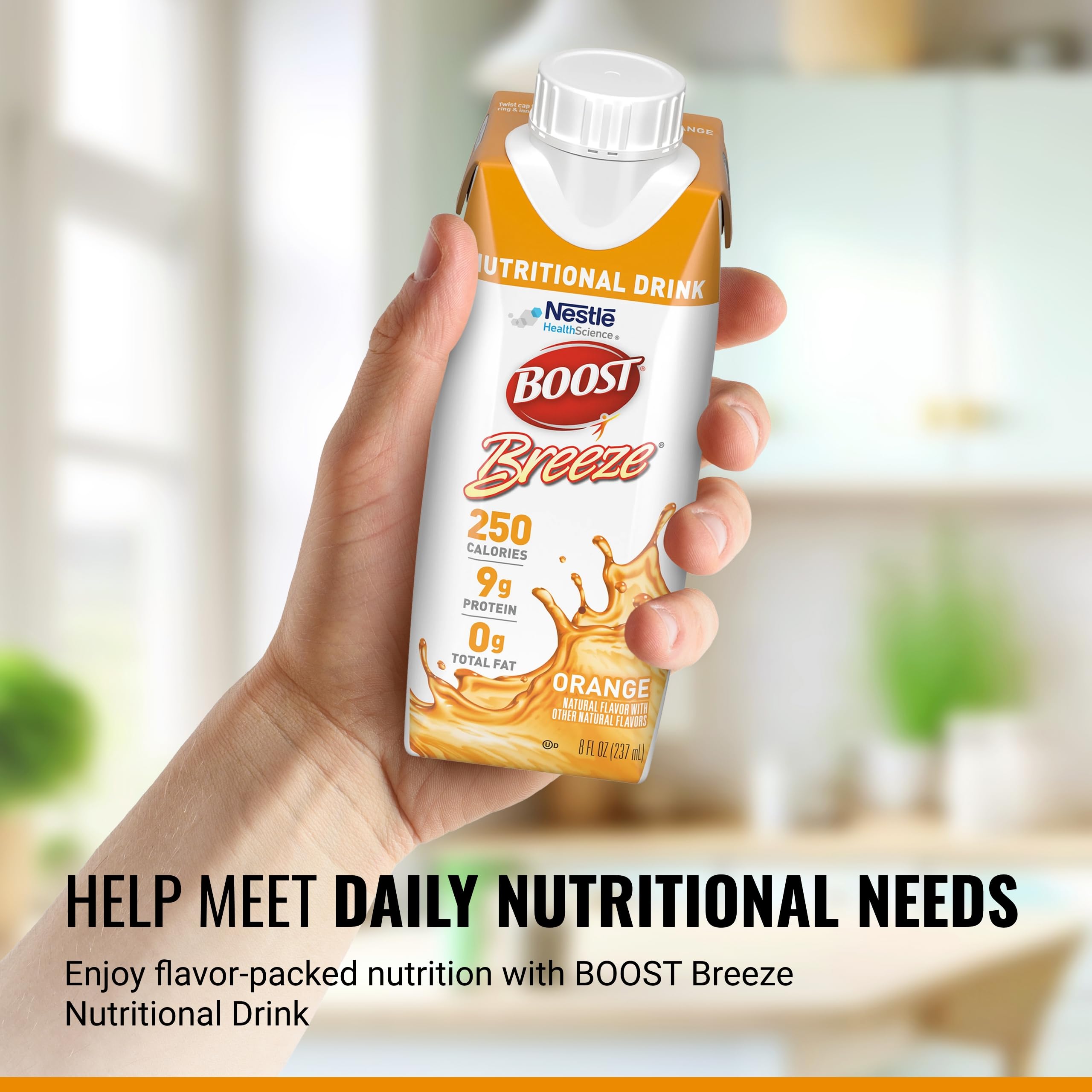 BOOST Breeze clear orange liquid in a glass, light and refreshing.