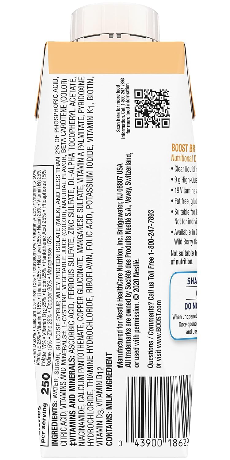 Close-up of BOOST Breeze orange nutritional drink being poured into a glass.