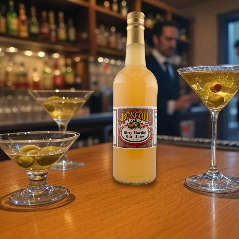 Boscoli olive brine in a glass with garnish, ideal for home bartenders.
