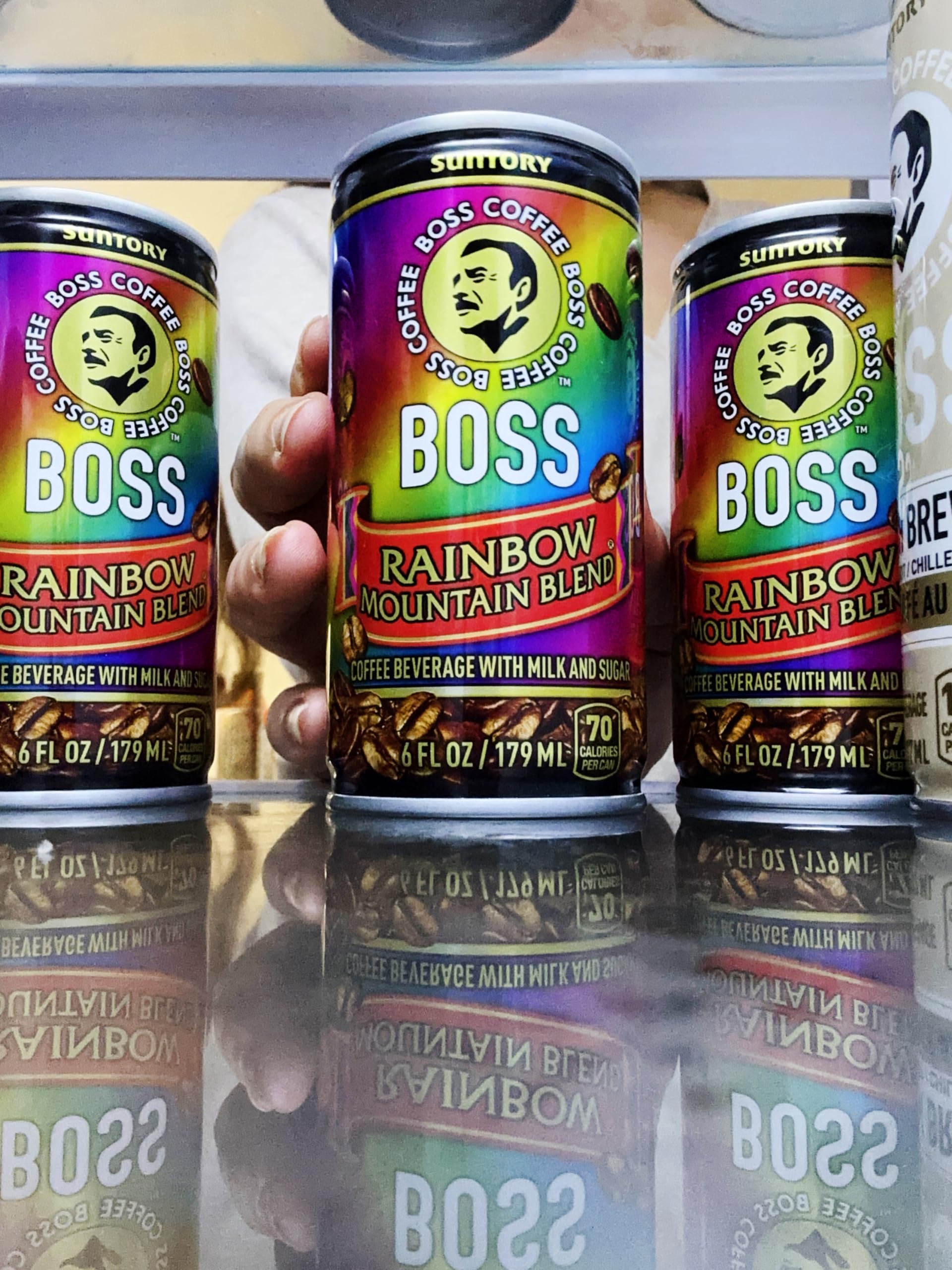 BOSS Rainbow Mountain can in hand ready for daily use