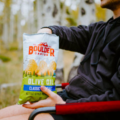 Boulder Canyon kettle-cooked chips close-up emphasizes satisfying crunch for a quick bite.
