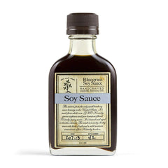 Bluegrass Soy Sauce bottle highlights microbrewed US craft and Kentucky ingredients for savory dishes.