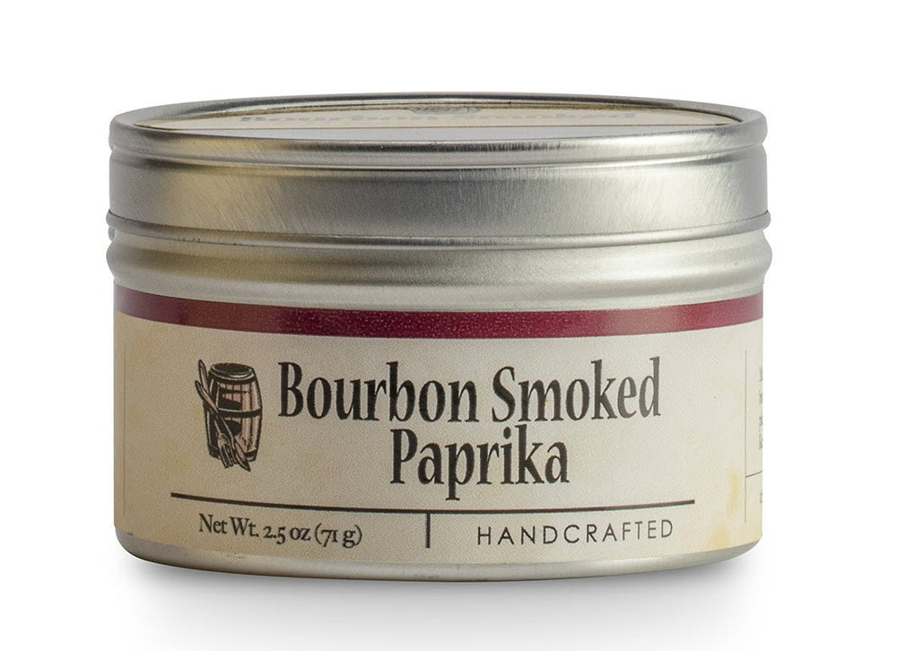 Bourbon Barrel Foods Bourbon Smoked Paprika jar enhances poultry and vegetables with smoky depth.