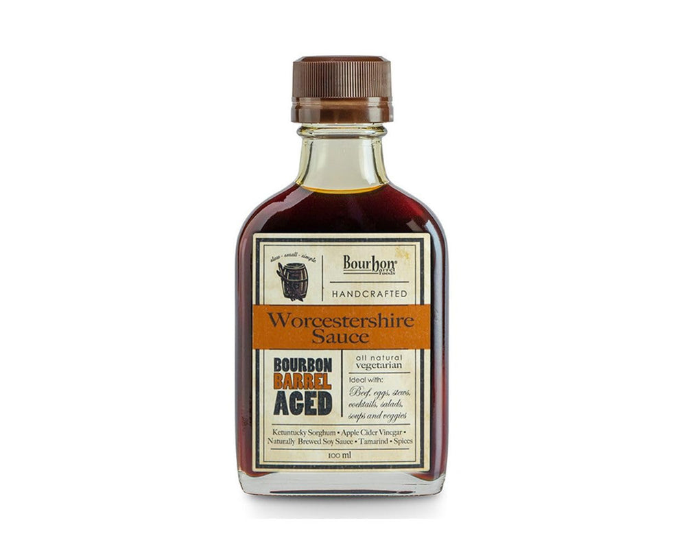 Bourbon Barrel Foods Worcestershire bottle pour highlights bourbon aged flavor for Bloody Marys and grilling.