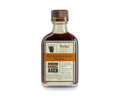 Bourbon Barrel Foods Worcestershire bottle pour highlights bourbon aged flavor for Bloody Marys and grilling.