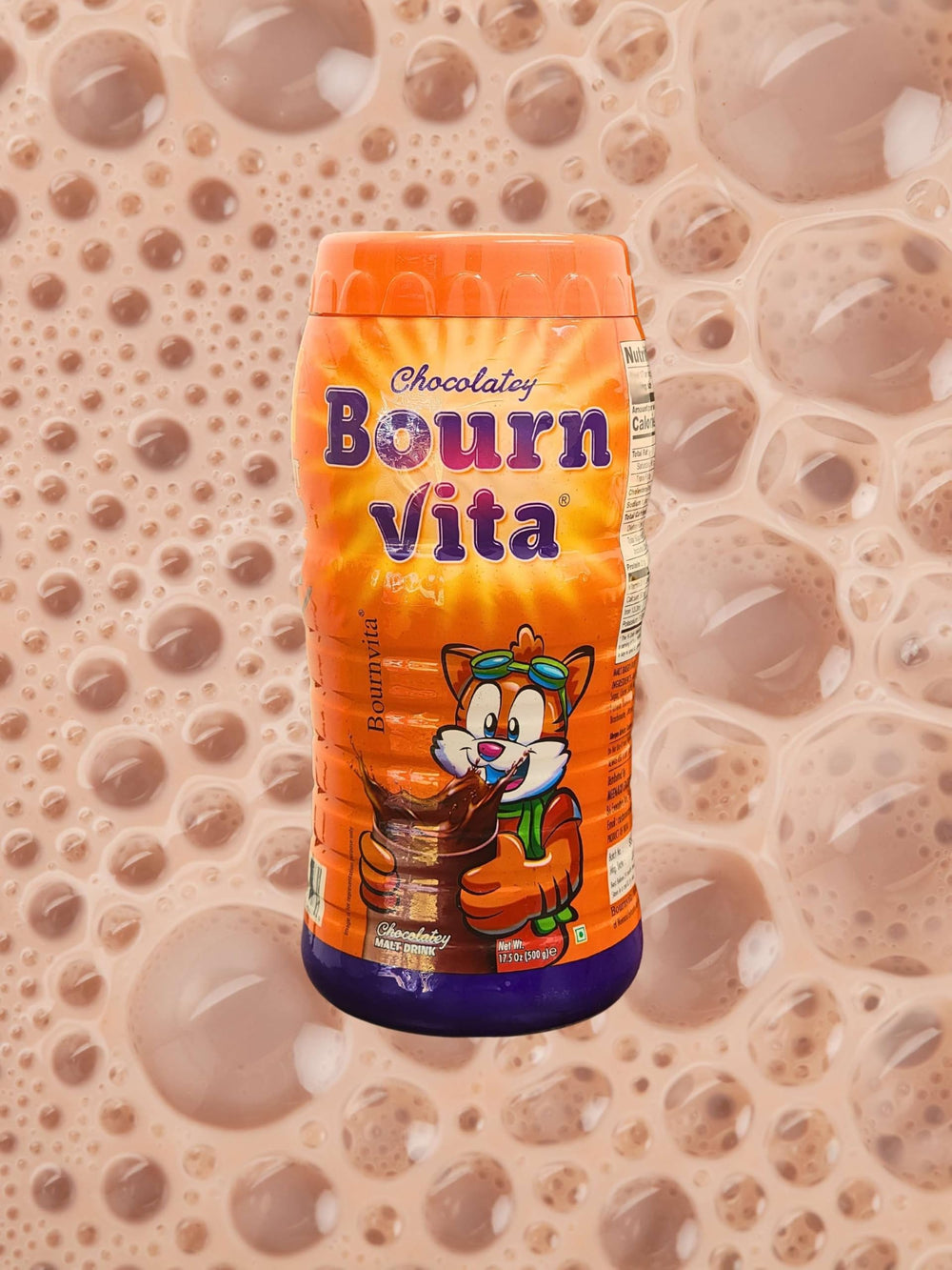 Bournvita family enjoying a chocolate drink together