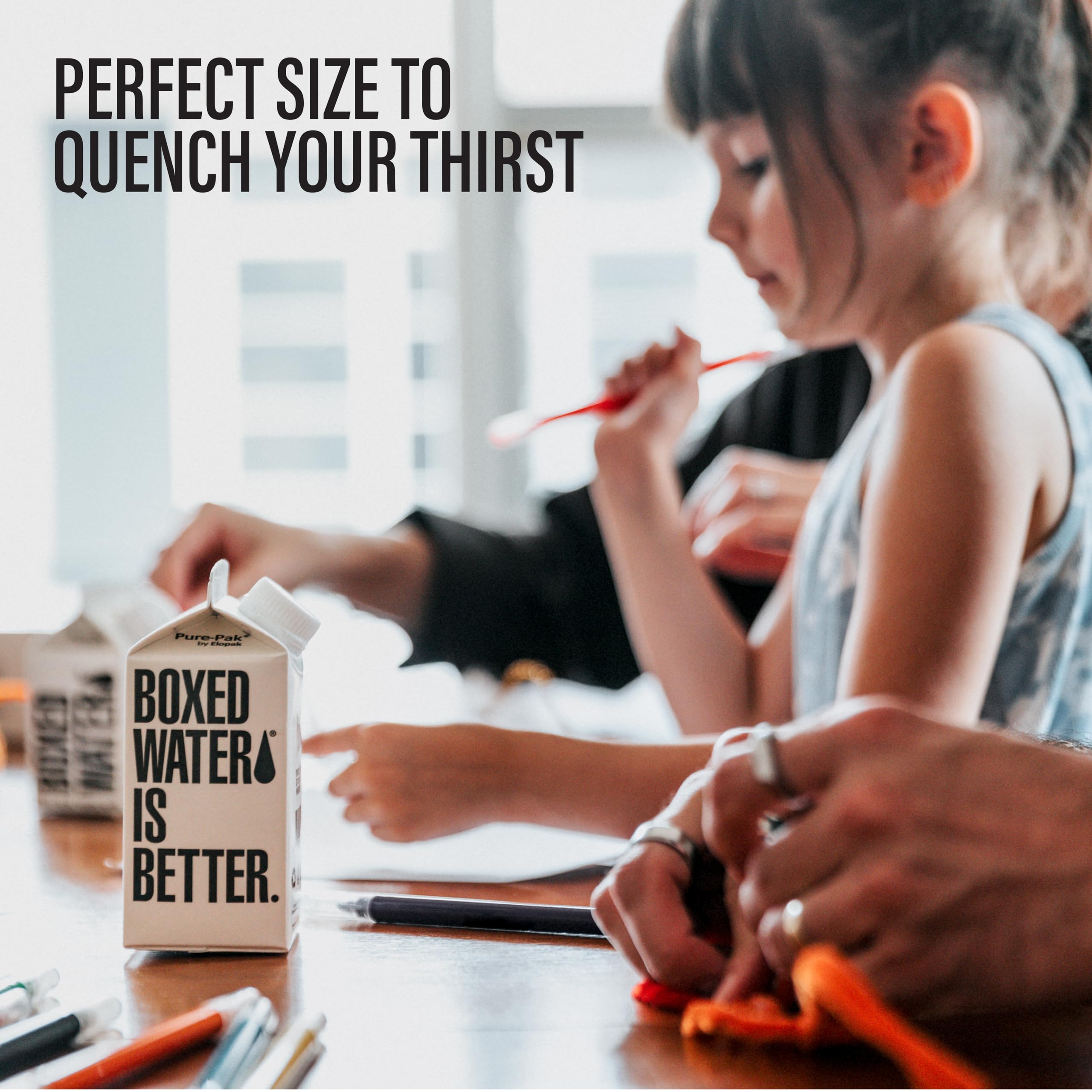 Boxed Water Is Better water being poured, showcasing pure taste.
