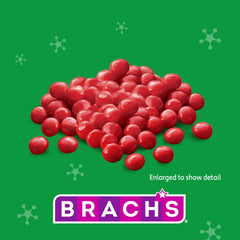 Brach's Cinnamon Imperials candies closeup, showcases bright red color and spicy aroma.