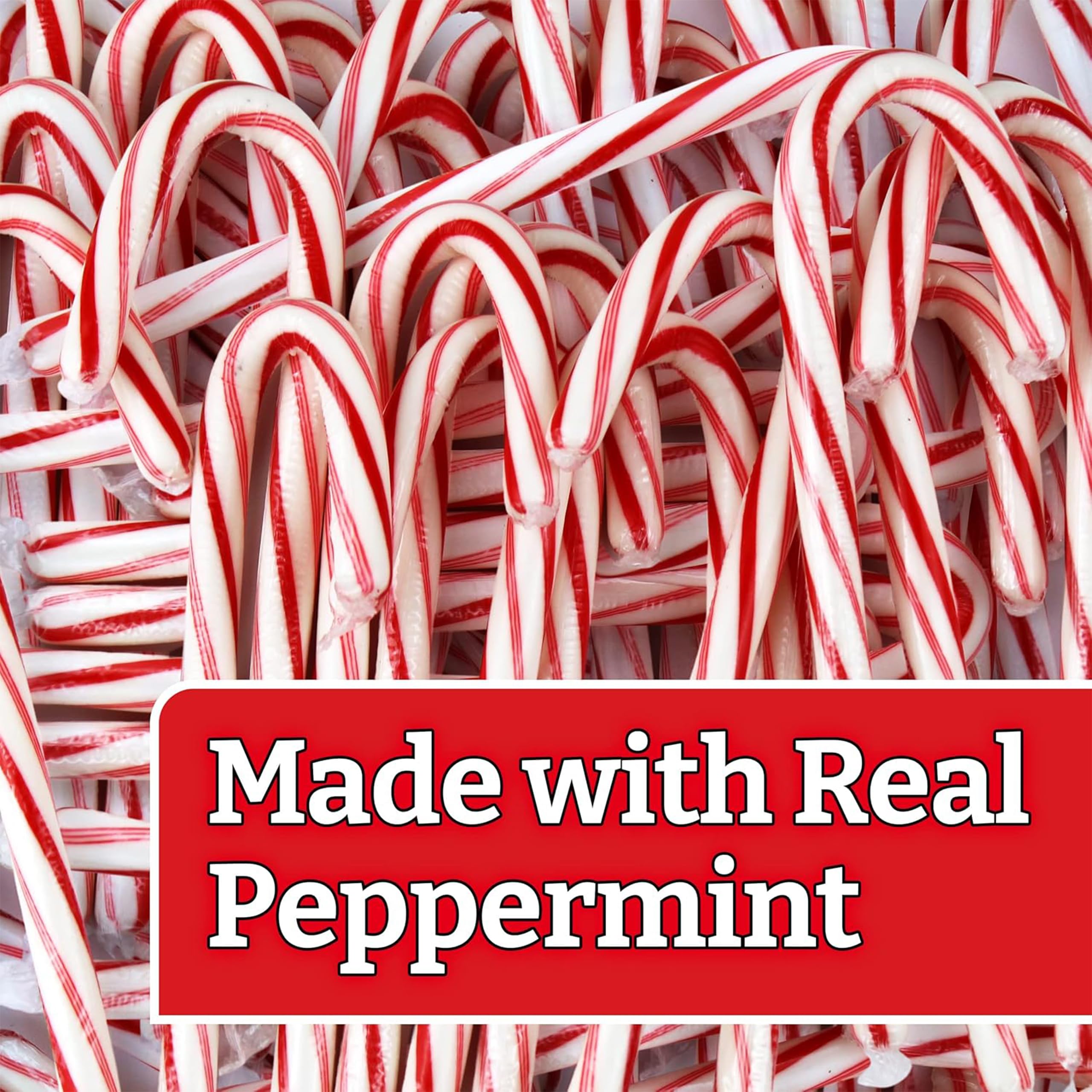 Brach's peppermint candy canes display on a holiday dispenser.