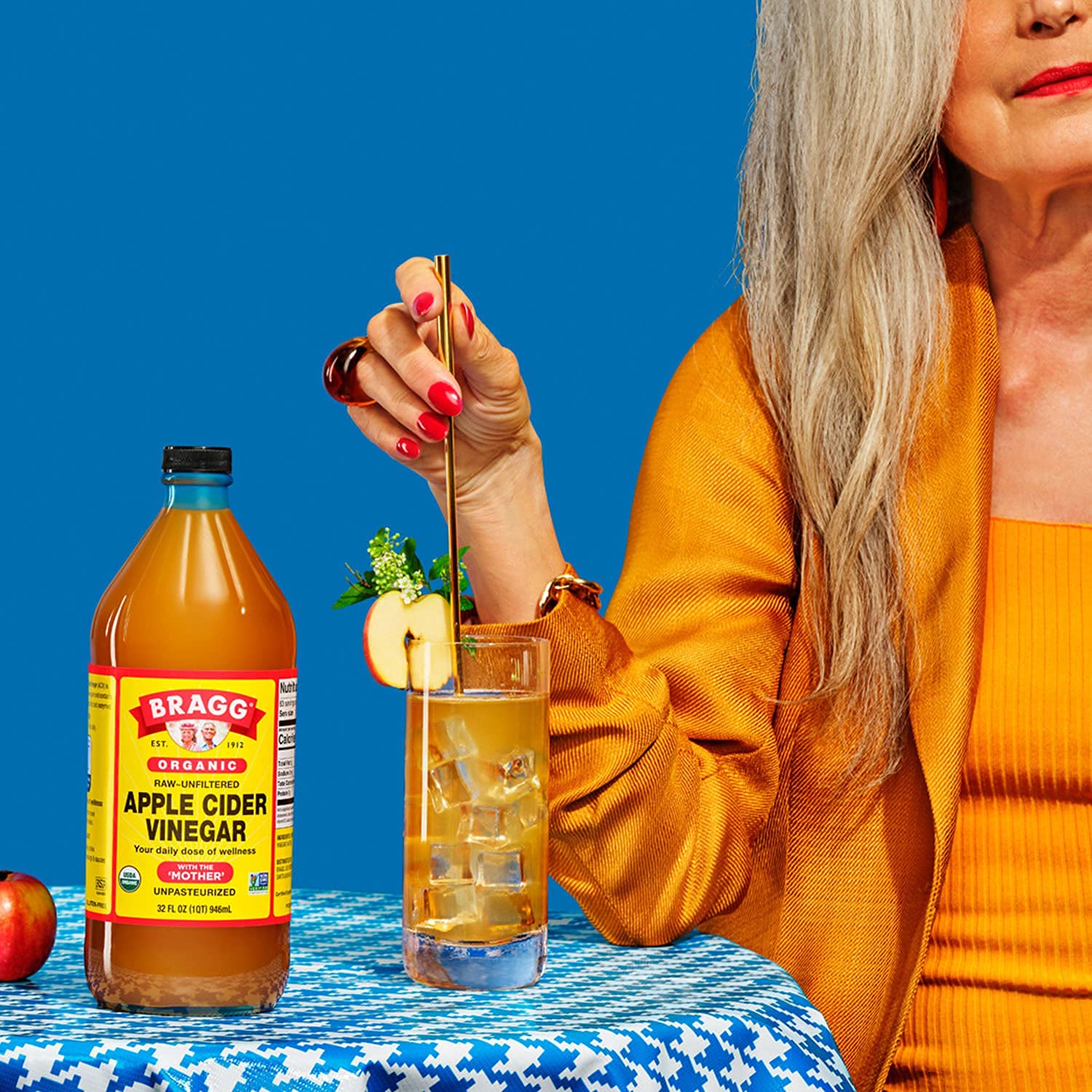 Bragg organic apple cider vinegar in a glass kitchen bottle for easy pouring.
