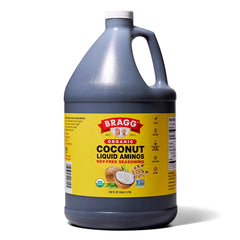 Bragg Coconut Aminos bottle pour, soy-free seasoning for quick meals.
