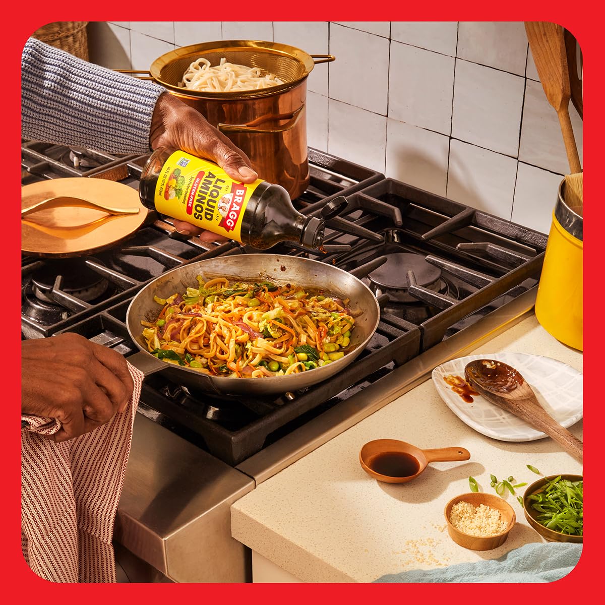 Bragg Liquid Aminos bottle on kitchen counter ready to season meals