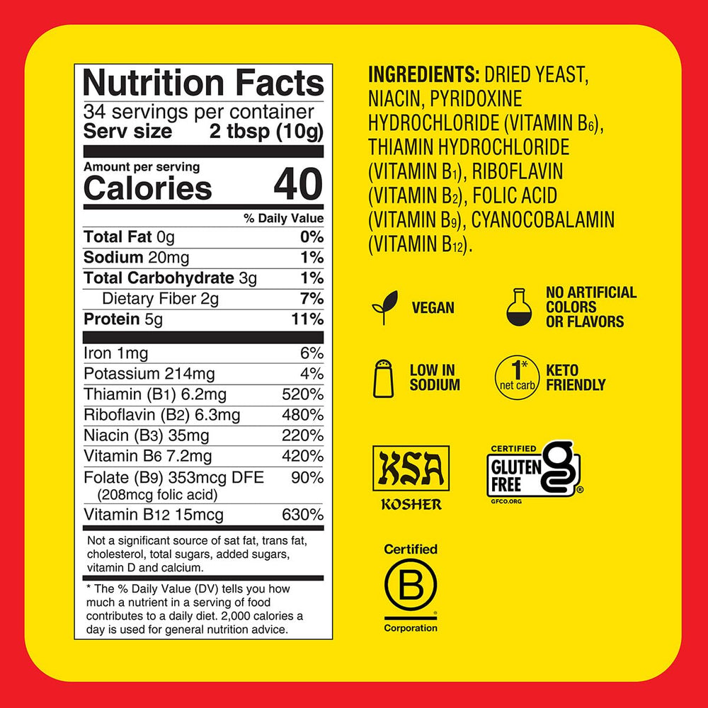 Bragg nutritional yeast seasoning bottle close-up with powder texture and label.