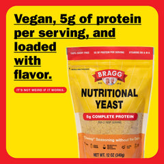 Bragg nutritional yeast dusting over steaming pasta for savory flavor.