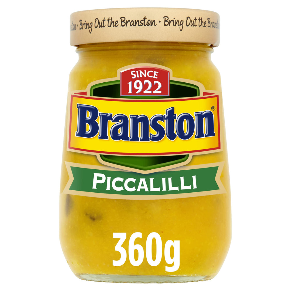 Branston Piccalilli 360g jar on kitchen counter, tangy crunch ready to elevate meals.