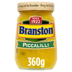 Branston Piccalilli 360g jar on kitchen counter, tangy crunch ready to elevate meals.