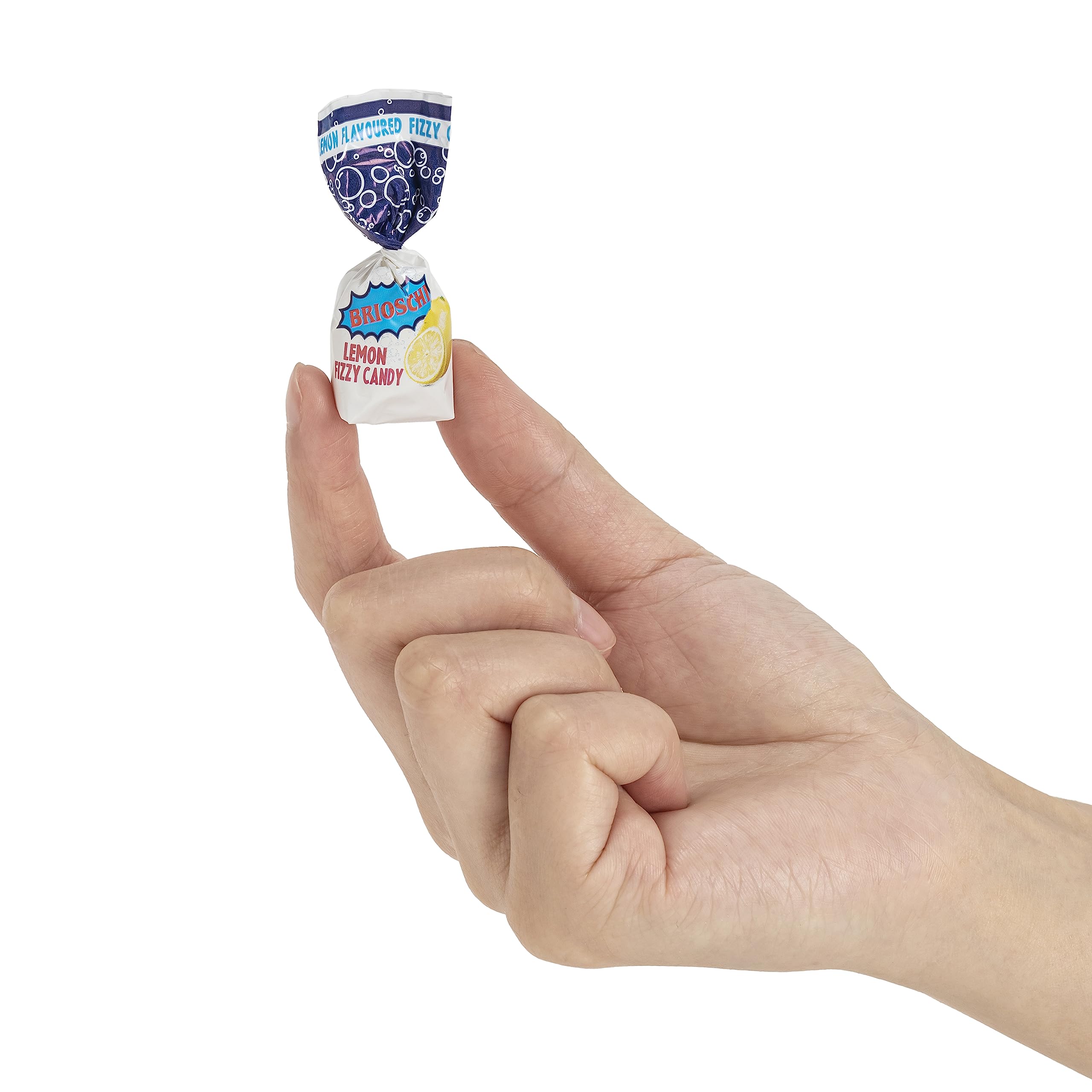 Brioschi lemon candy in hand showing citrus notes and convenience.