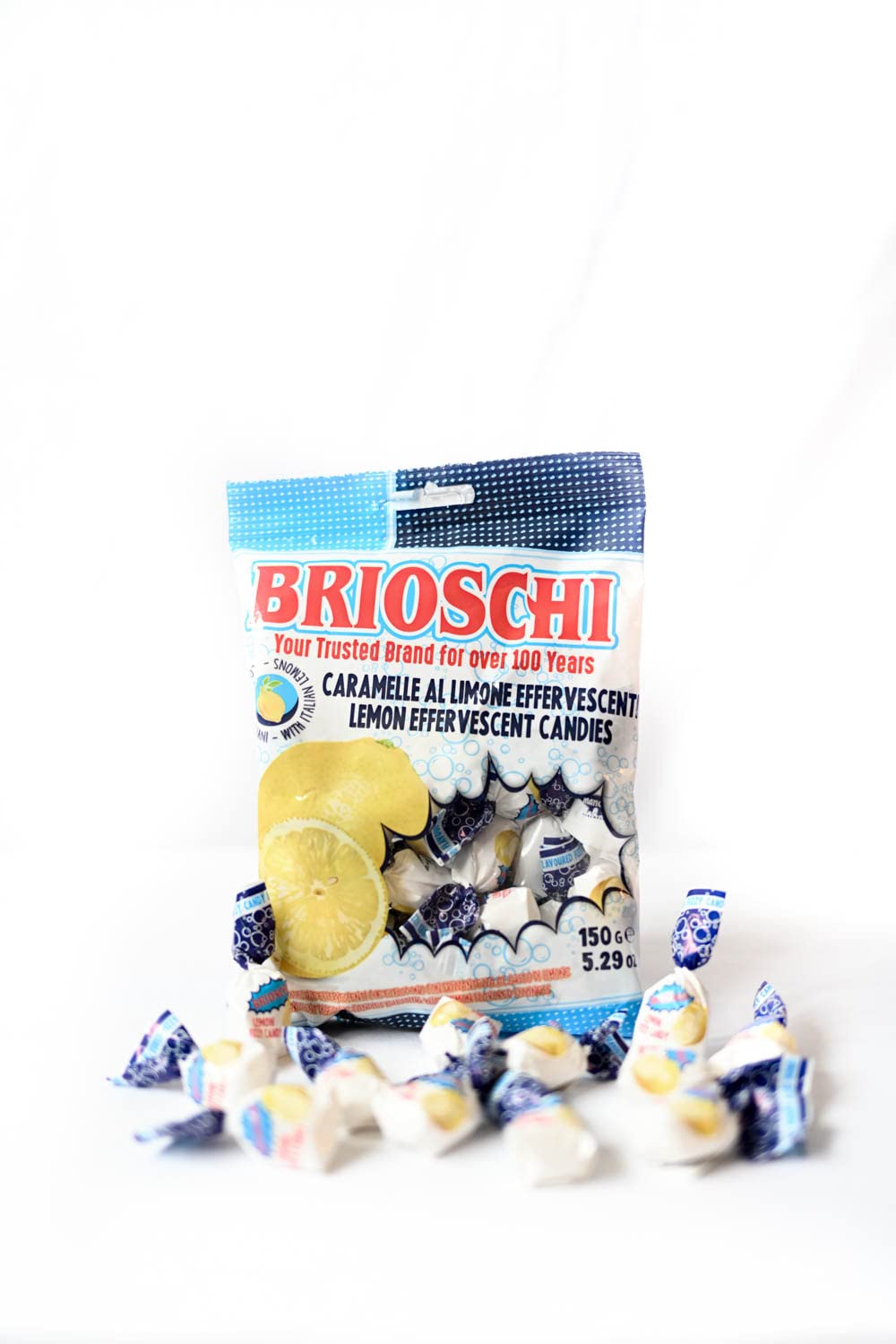 Brioschi lemon candy serving suggestion with two pieces for sharing.
