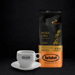 Bristot Moka Oro ground coffee aroma steams from a freshly poured cup