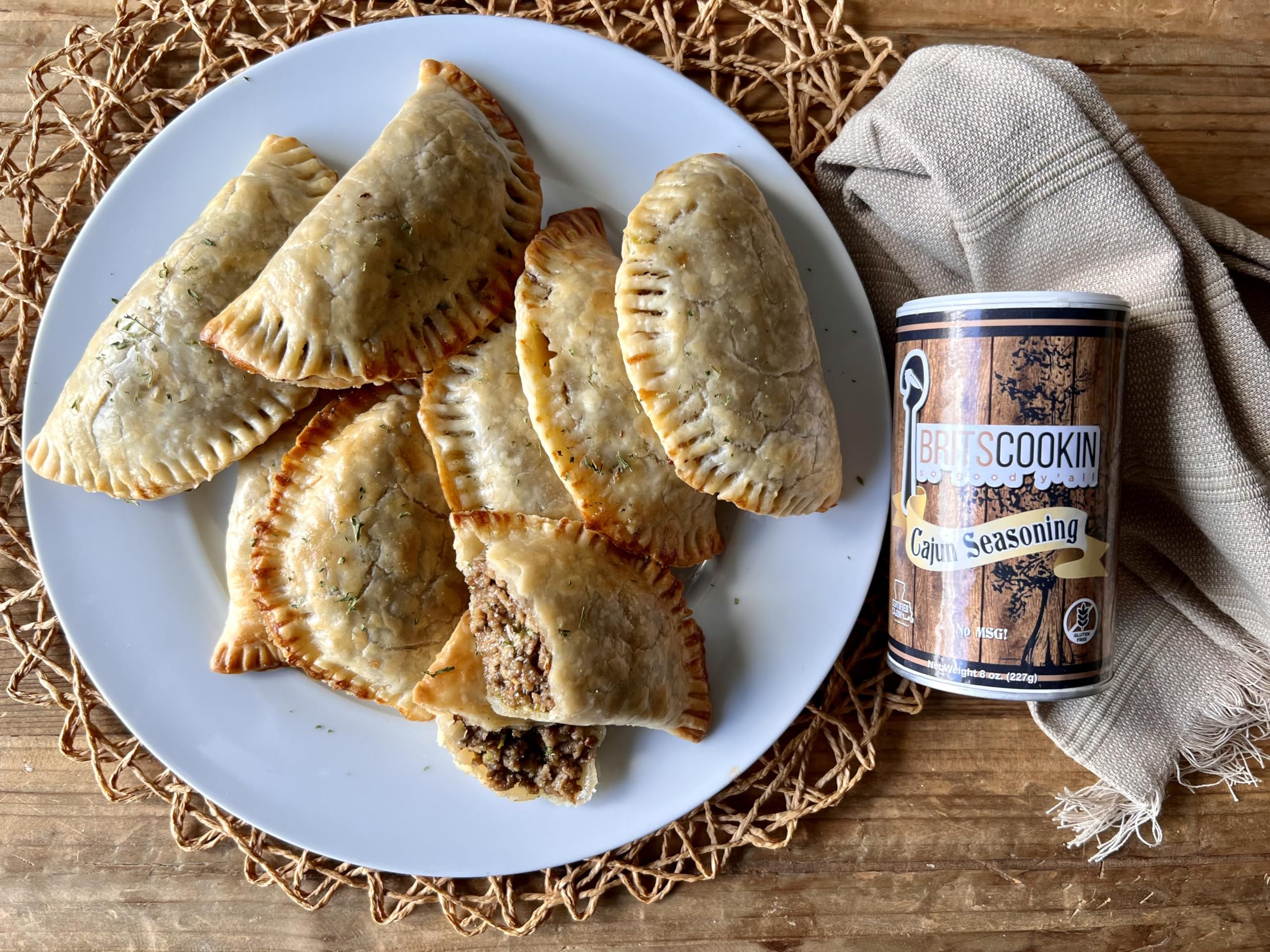 Britscookin Cajun Seasoning sprinkle on fish to enhance seafood with Cajun warmth.