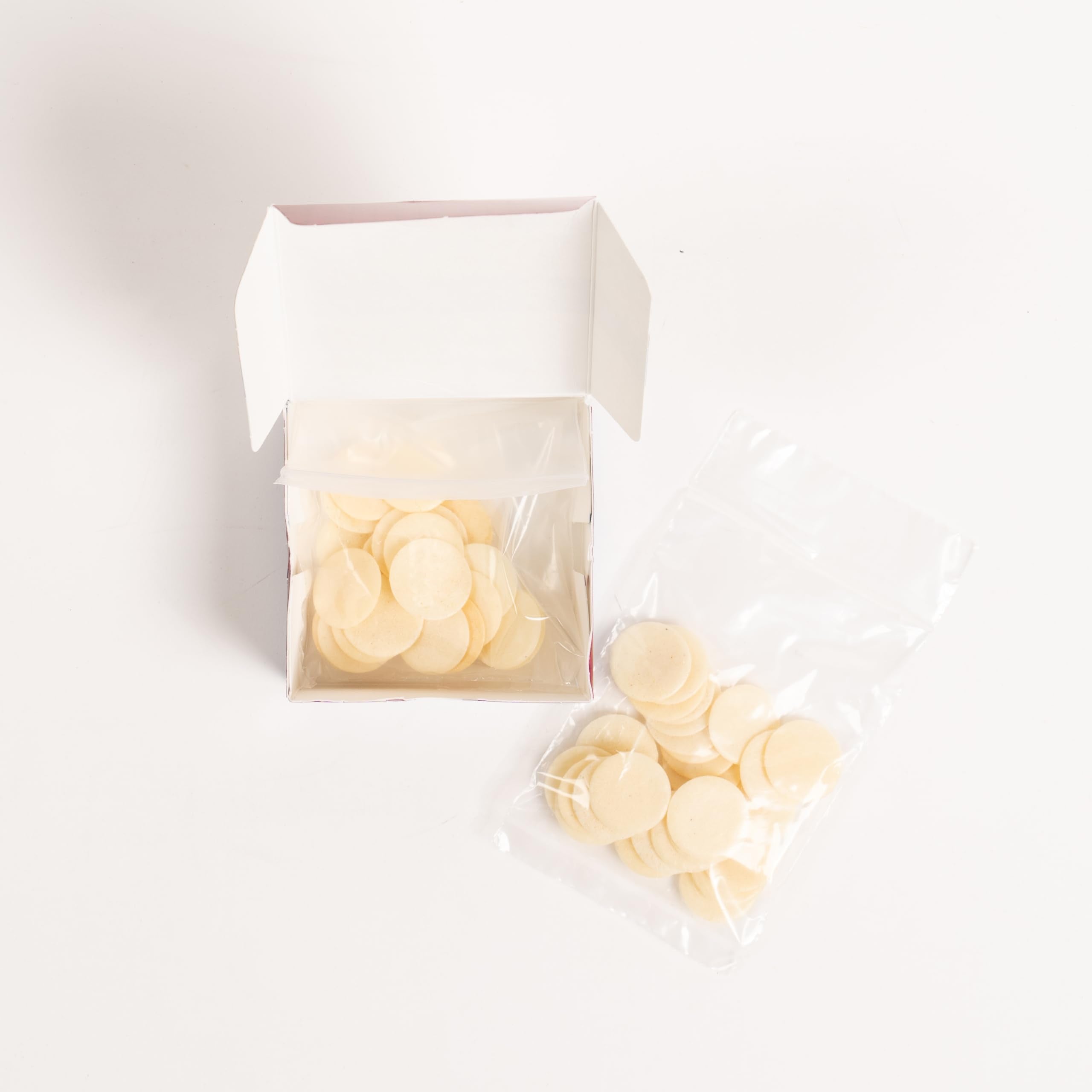 Broadman 50-count wafers on table, ready for distribution.
