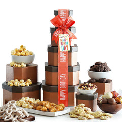 Broadway Basketeers Birthday Gift Basket Tower front view with assorted cookies and candies for celebrations.