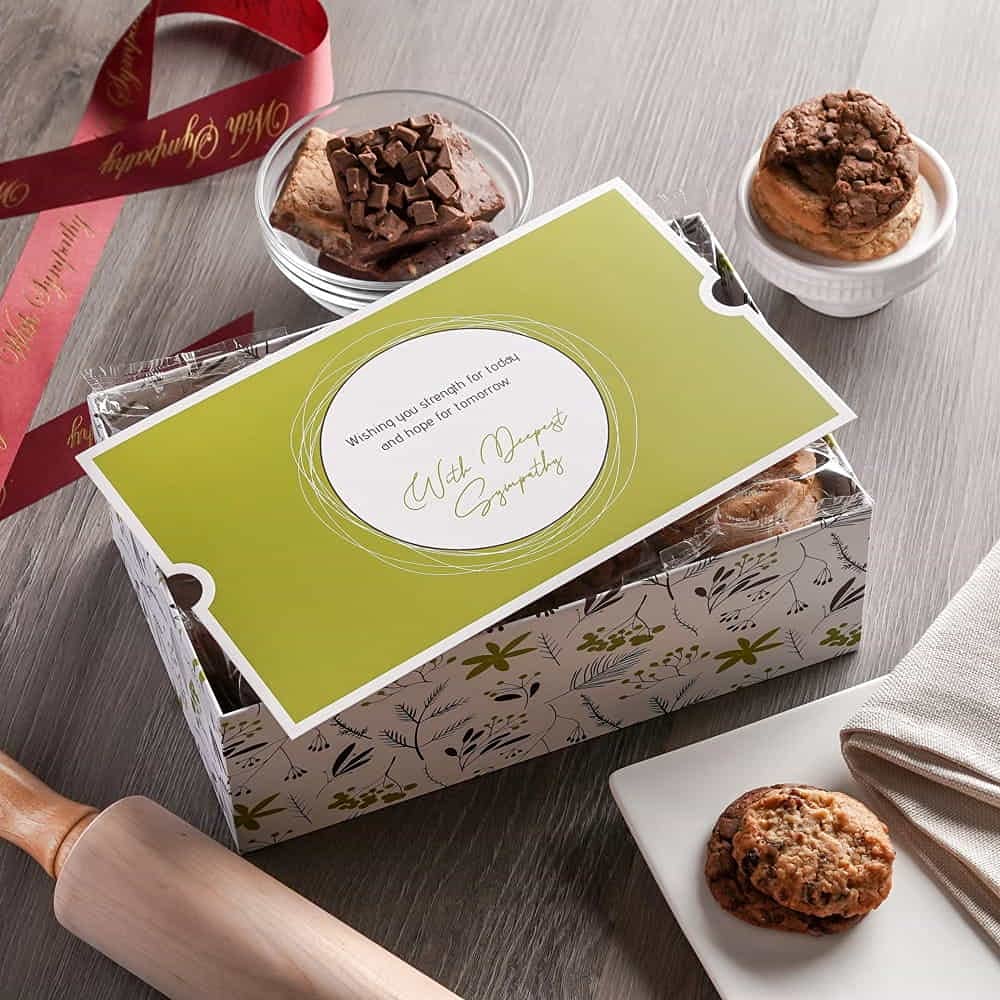 Broadway Basketeers kosher gift box prepared to give, wrapped with sympathy bow