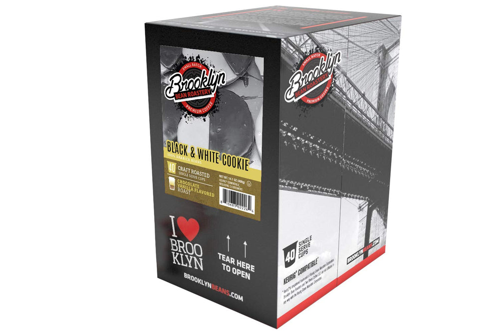 Brewing Brooklyn Beans Black and White Cookie pods into a cup, releasing aroma.