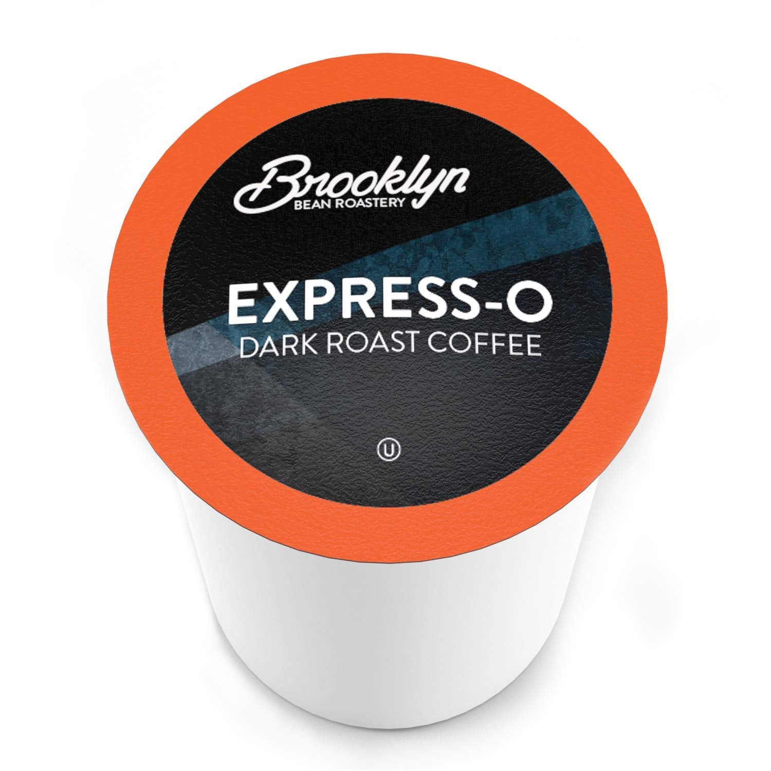 Brooklyn Beans Express-O pods beside Keurig machine for quick coffee.
