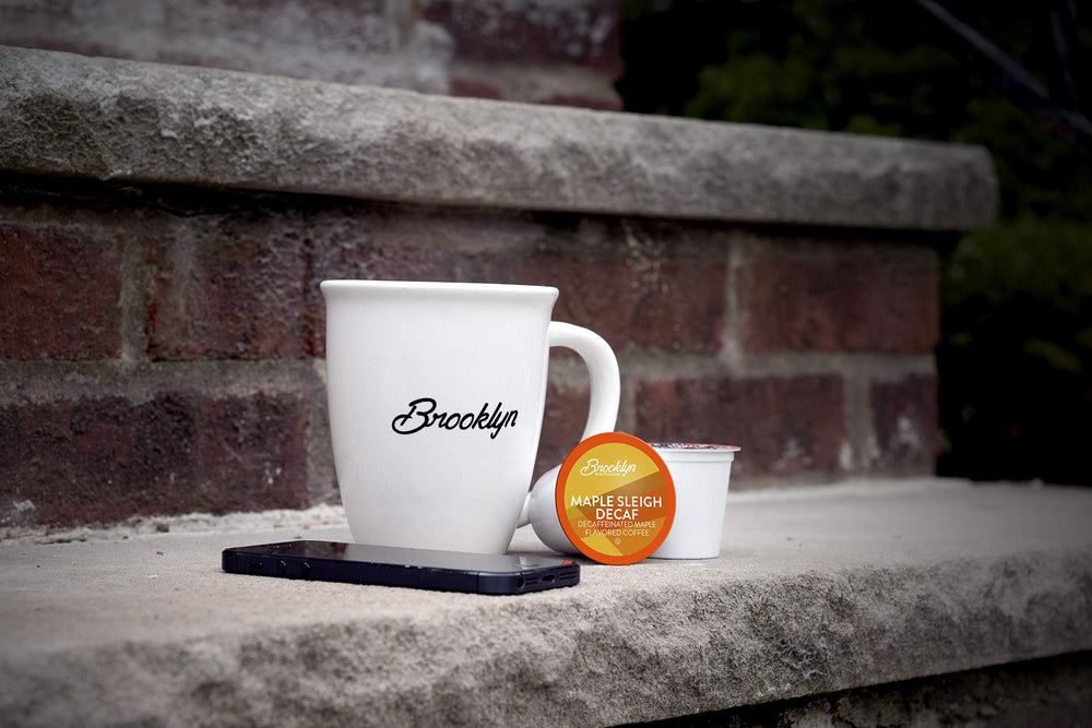 Steam rising from a Brooklyn Beans Maple Sleigh cup invites a smooth decaf experience.