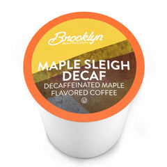 Brooklyn Beans Maple Sleigh decaf cup steaming with rich maple aroma.
