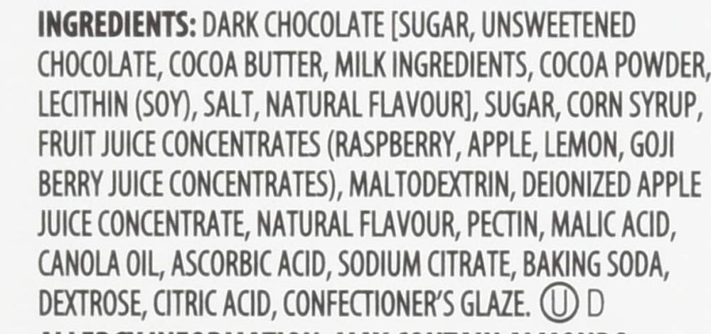 Brookside dark chocolate covered fruit pack in hand, perfect on-the-go treat.