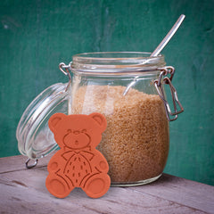 Brown Sugar Bear with pantry items keeping them dry and crispy.