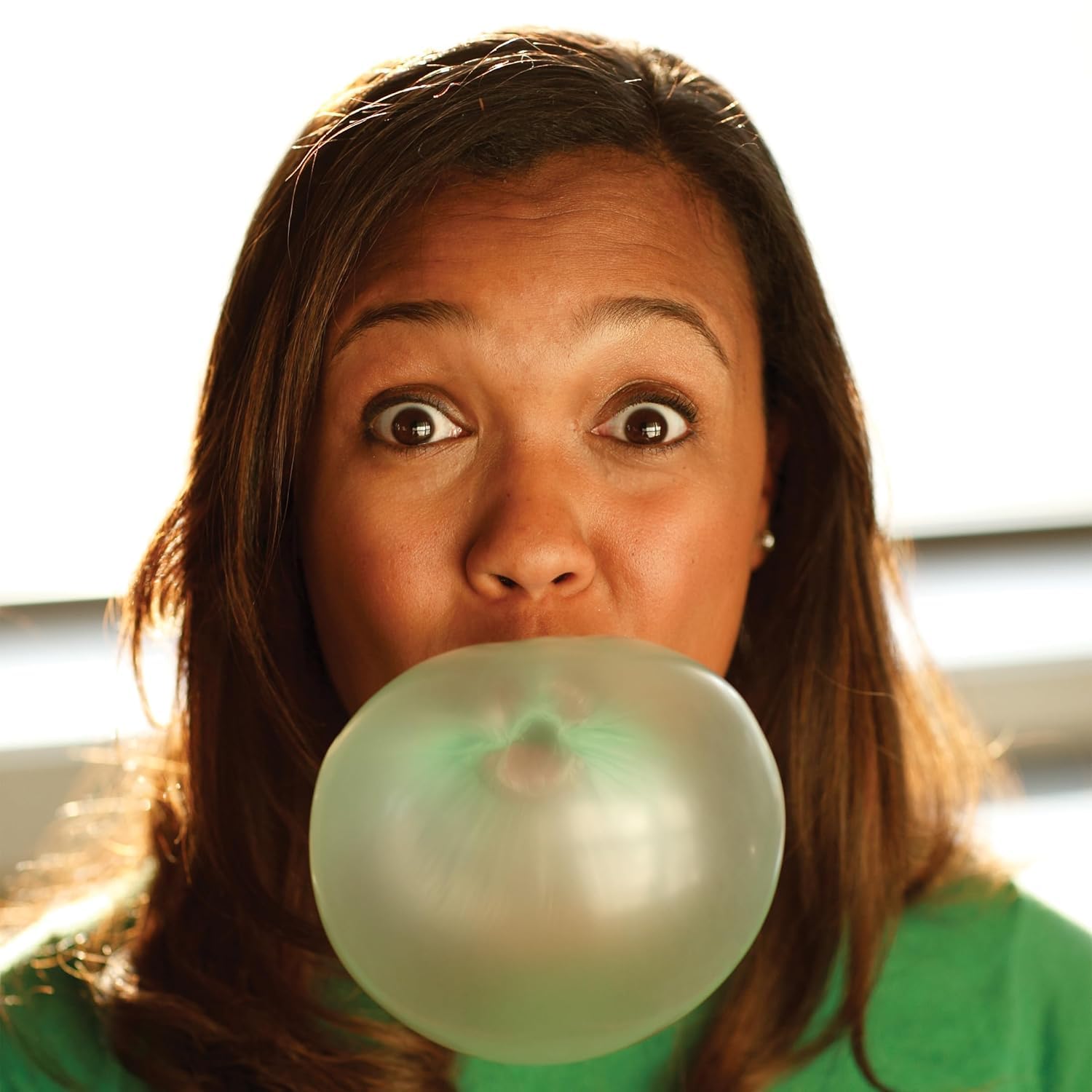 Close-up of Bubblicious Watermelon gum, showcasing its soft texture for bubbles.
