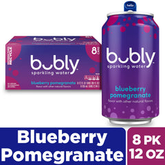 Poured Bubly Blueberry Pomegranate into a glass with bubbles and ice