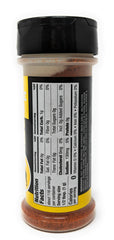 Buffalo Wild Wings chipotle pepper seasoning being sprinkled on wings for smoky heat.