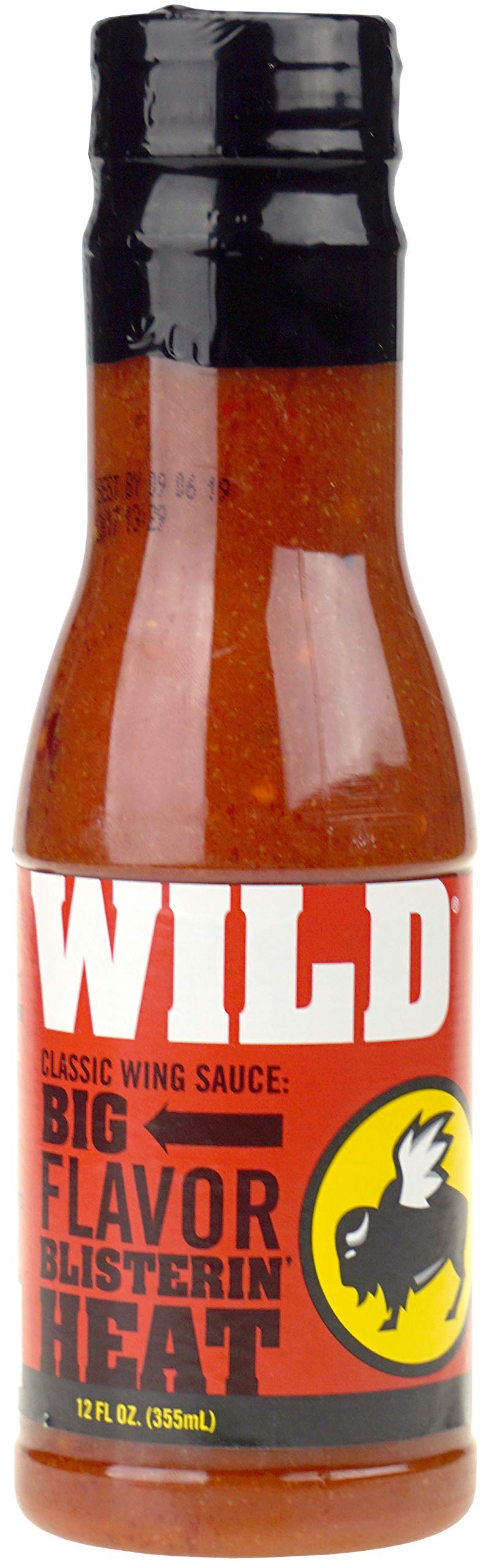 Buffalo Wild Wings Wild sauce bottle pouring over wings for bold flavor