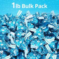 Close-up of Buha Sweets Cookies & Cream Kisses reveals smooth white chocolate with cookie bits.