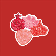 Buha Sweets fruit-shaped red gummies with smiling faces for playful bowls.