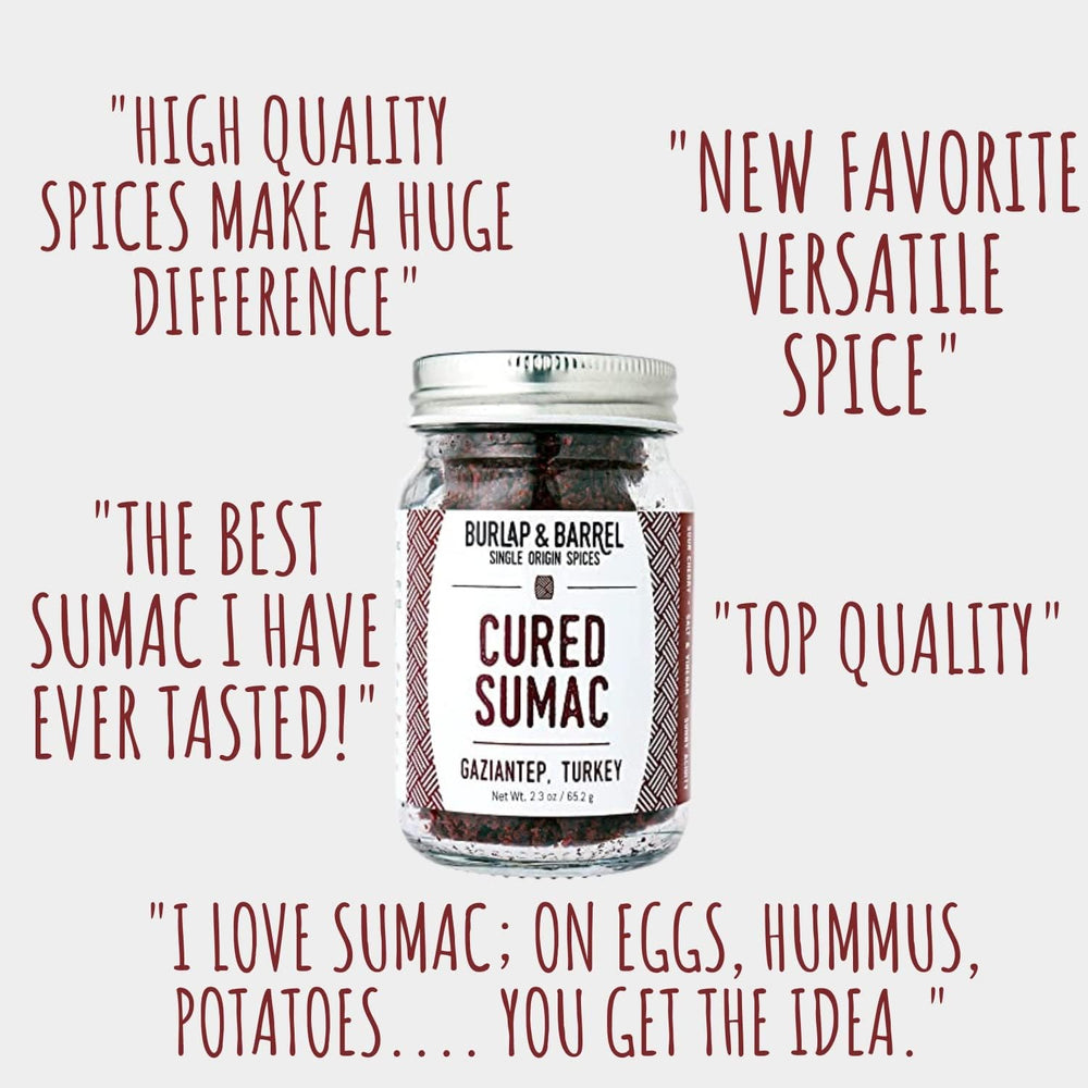 Burlap & Barrel sumac jar close-up reveals salt-preserved tartness for hummus.