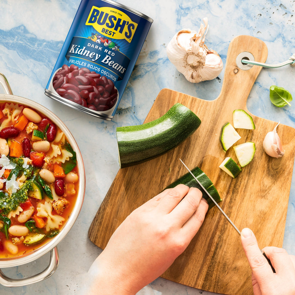 BUSH'S BEST 12-pack beans display on shelf, easy pantry staple.