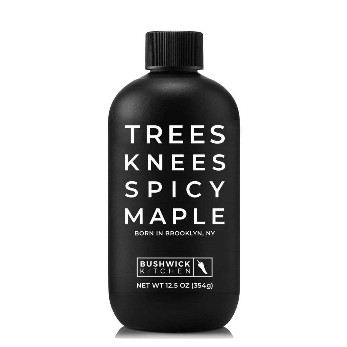 Bushwick Kitchen Trees Knees bottle pouring spicy maple syrup.
