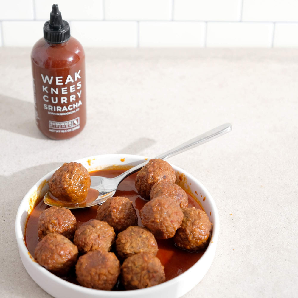 Eggs on toast topped with Bushwick Kitchen Weak Knees Curry Sriracha.