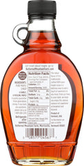 Butternut Mountain Farm Robust Dark Maple Syrup in a glass jar on a breakfast spread.