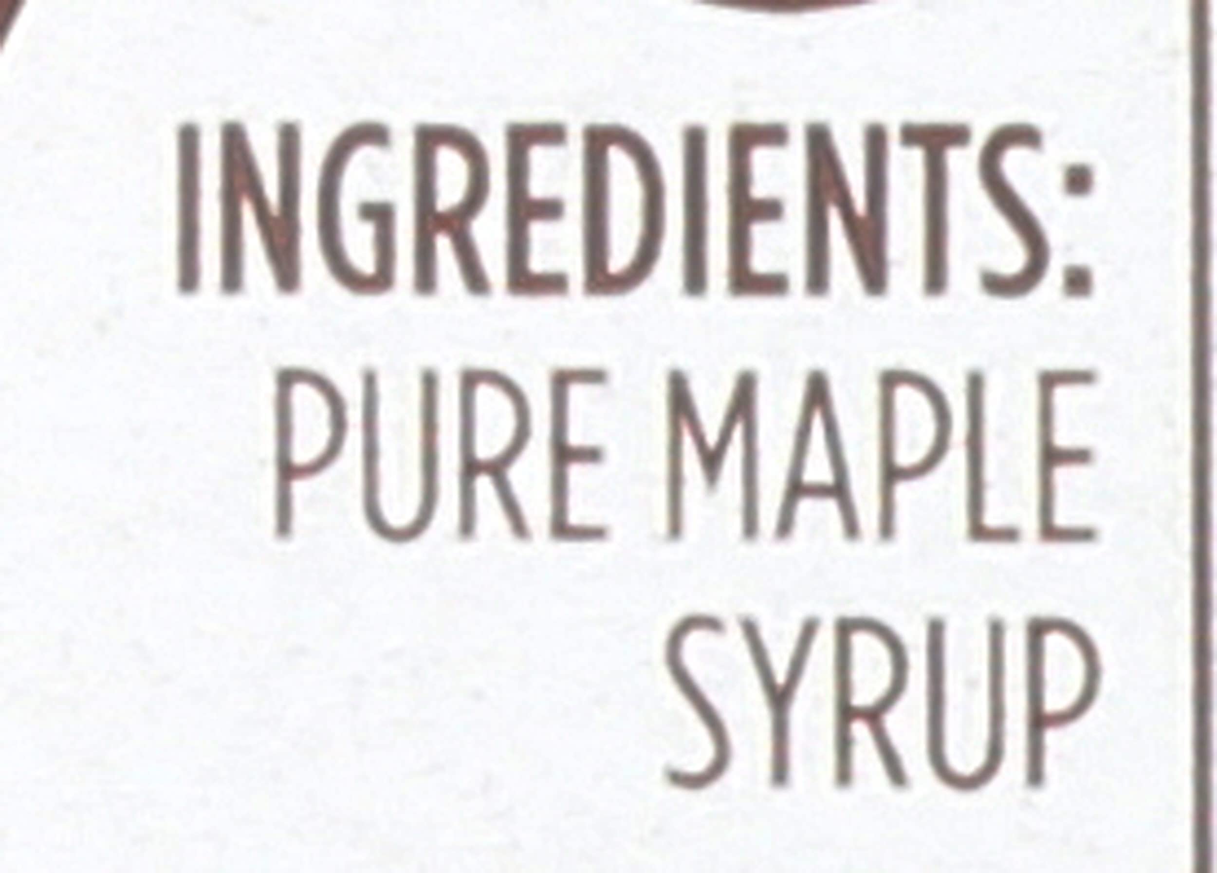 Butternut Mountain Farm Robust Dark Maple Syrup drizzle on vanilla yogurt.