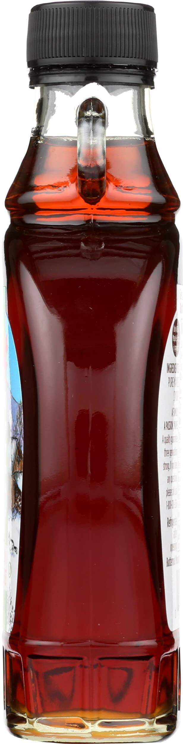 Butternut Mountain Farm Robust Dark Maple Syrup bottle in a cozy kitchen.