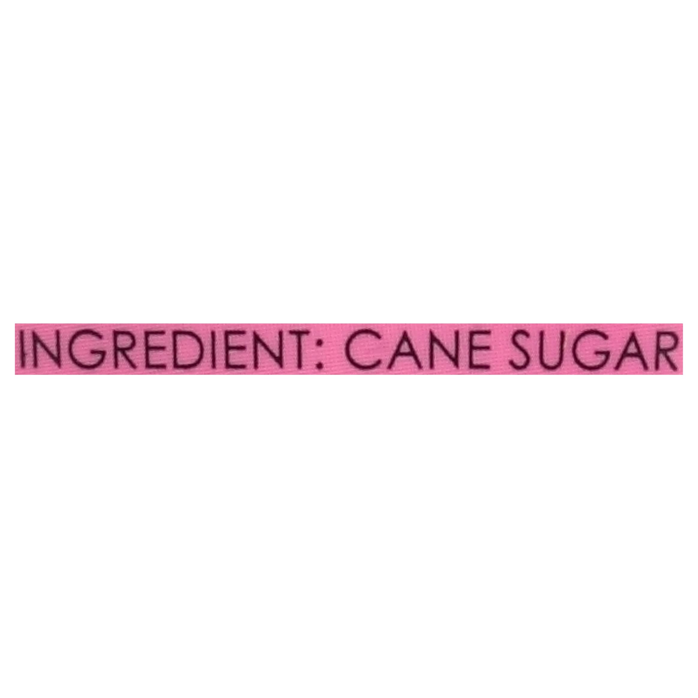 Pouring C&H Superfine sugar into coffee with flip-top canister