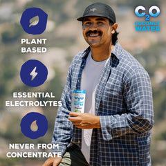 C2O coconut water poured into glass illustrating natural hydration.